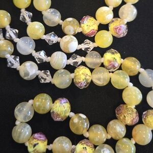 Handmade, beaded necklace with semi-precious stones, glass, and metal beads